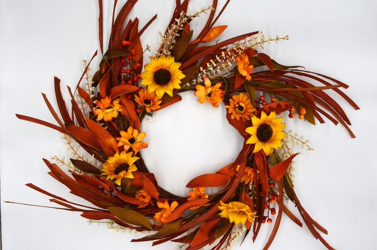 22086 - Large Summer/Autumn hanging wreath. Beautiful floral arrangement of glowing sunflowers entwined with delicate white flowers, berries and soft textures of grass. Approx Size:  70cm Outer Dia