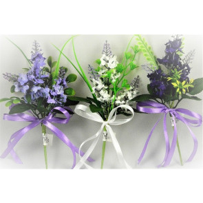33002 - Floral arrangement with delicate flowers and leaves embellished with a satin bow.  Height  20cms ,  Width  11cms  (approx) 
